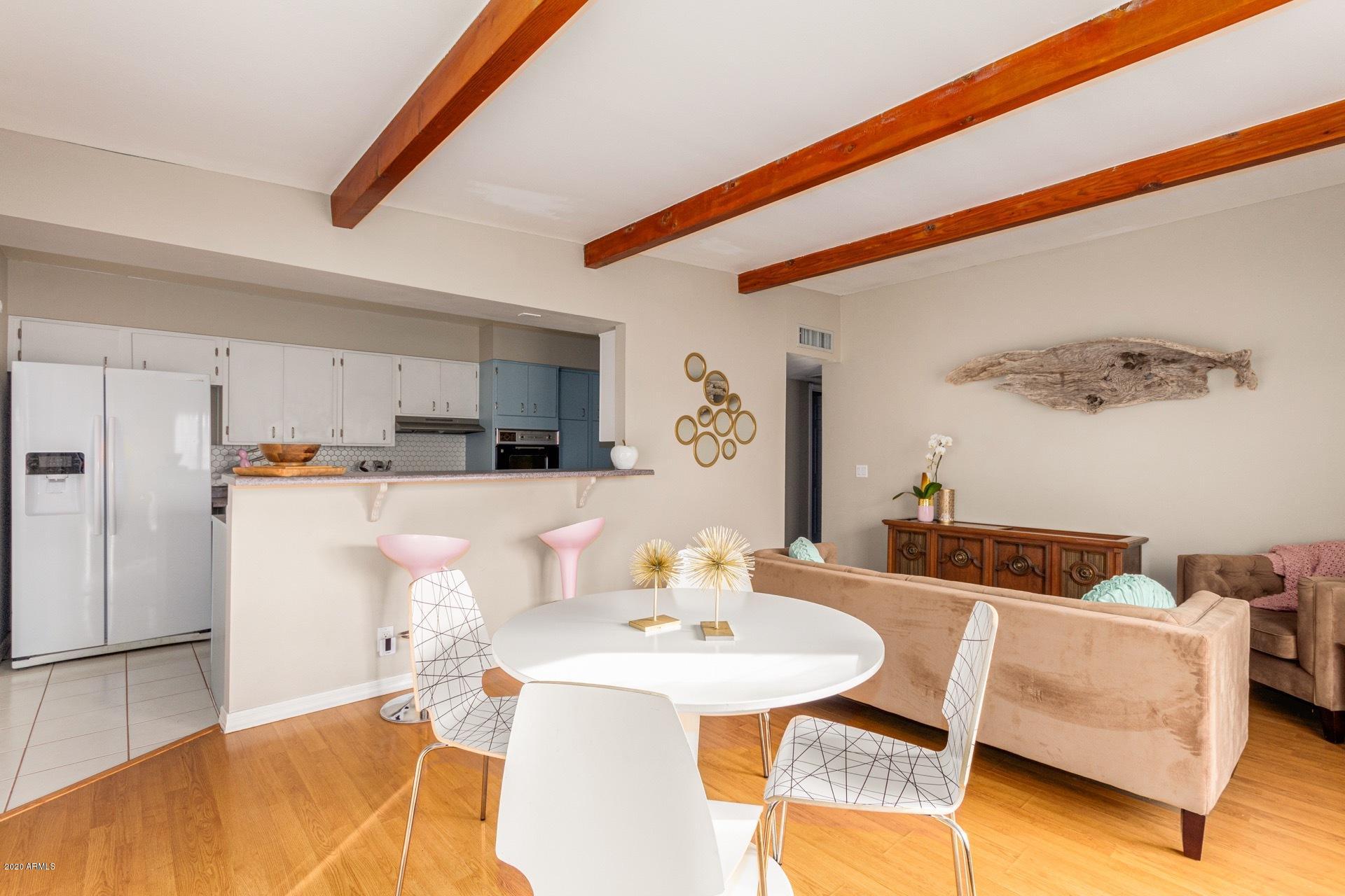 1732 North Queensbury Mesa, AZ 85201 - Photo 10 of 27 a living room with furniture and kitchen view
