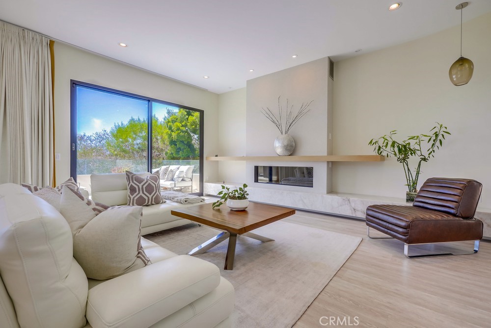 1725 Del Mar Avenue Laguna Beach, CA 92651 - Photo 13 of 63 a living room with furniture and a large window