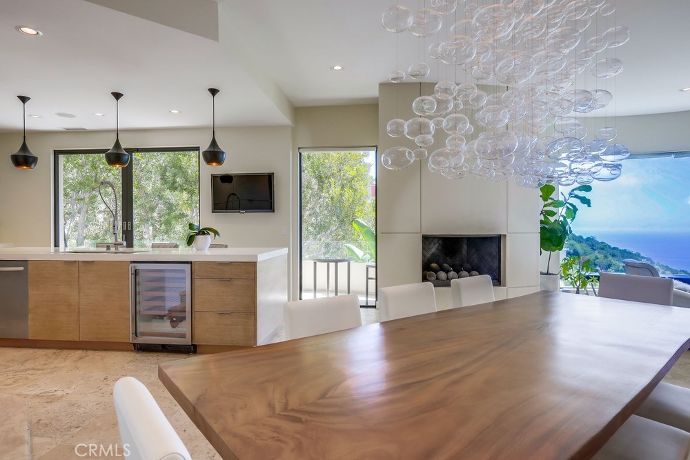 1725 Del Mar Avenue Laguna Beach, CA 92651 - Photo 24 of 63 a living room with fireplace furniture and a wooden floor