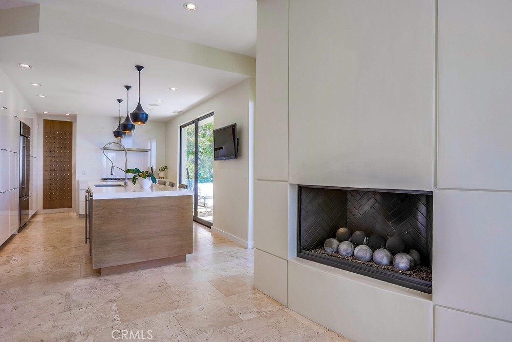 1725 Del Mar Avenue Laguna Beach, CA 92651 - Photo 25 of 63 a living room with furniture and a fireplace