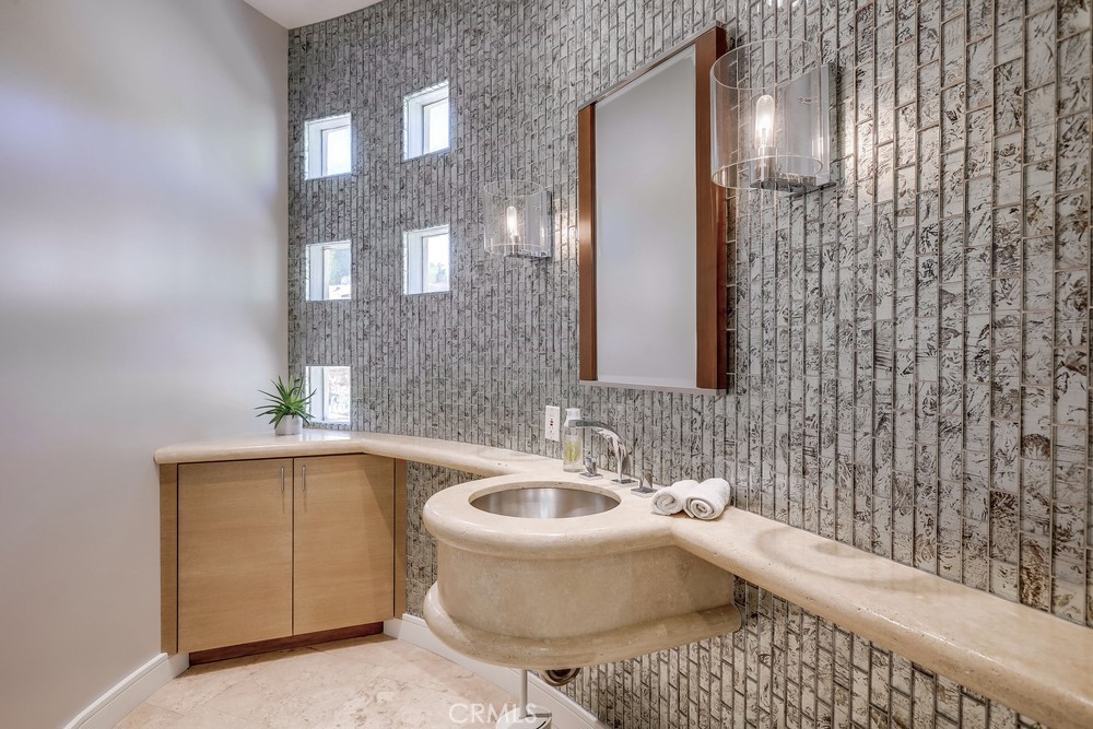 1725 Del Mar Avenue Laguna Beach, CA 92651 - Photo 30 of 63 a bathroom with a sink a toilet and shower