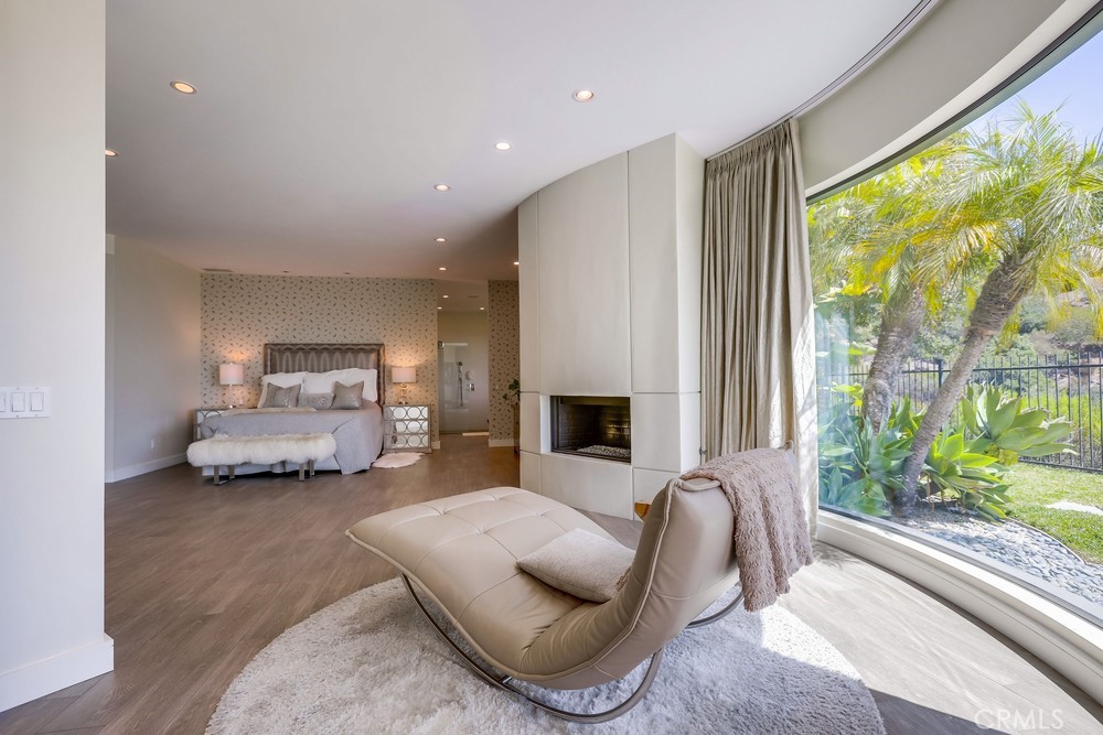 1725 Del Mar Avenue Laguna Beach, CA 92651 - Photo 35 of 63 a living room with furniture and a fireplace