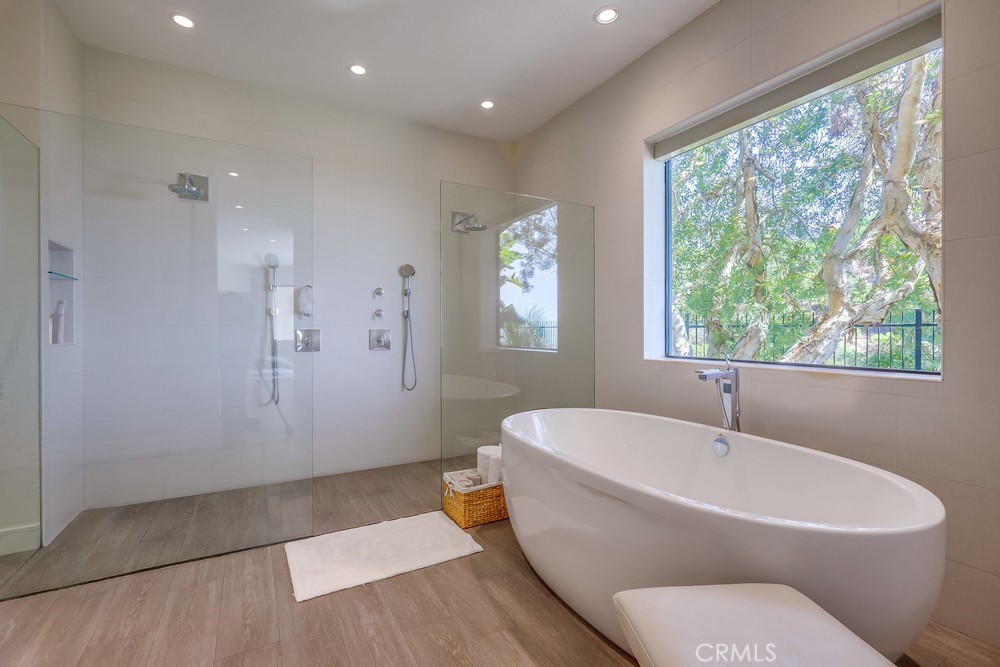 1725 Del Mar Avenue Laguna Beach, CA 92651 - Photo 38 of 63 a white bath tub sitting next to a white toilet