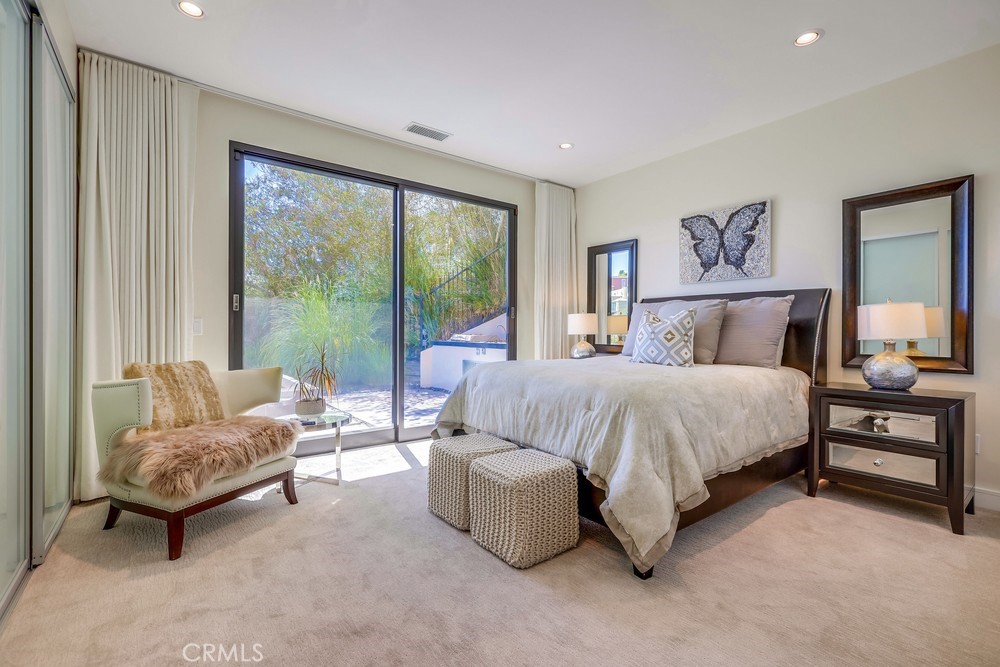 1725 Del Mar Avenue Laguna Beach, CA 92651 - Photo 47 of 63 a bedroom with bed and a couch