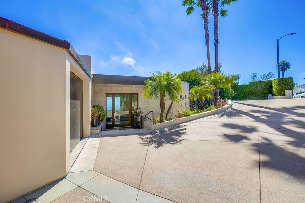 1725 Del Mar Avenue Laguna Beach, CA 92651 - Photo 7 of 63 a view of a house with backyard and swimming pool