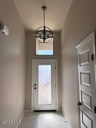 a view of a hallway to a room