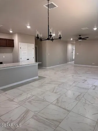 a view of a kitchen with a sink
