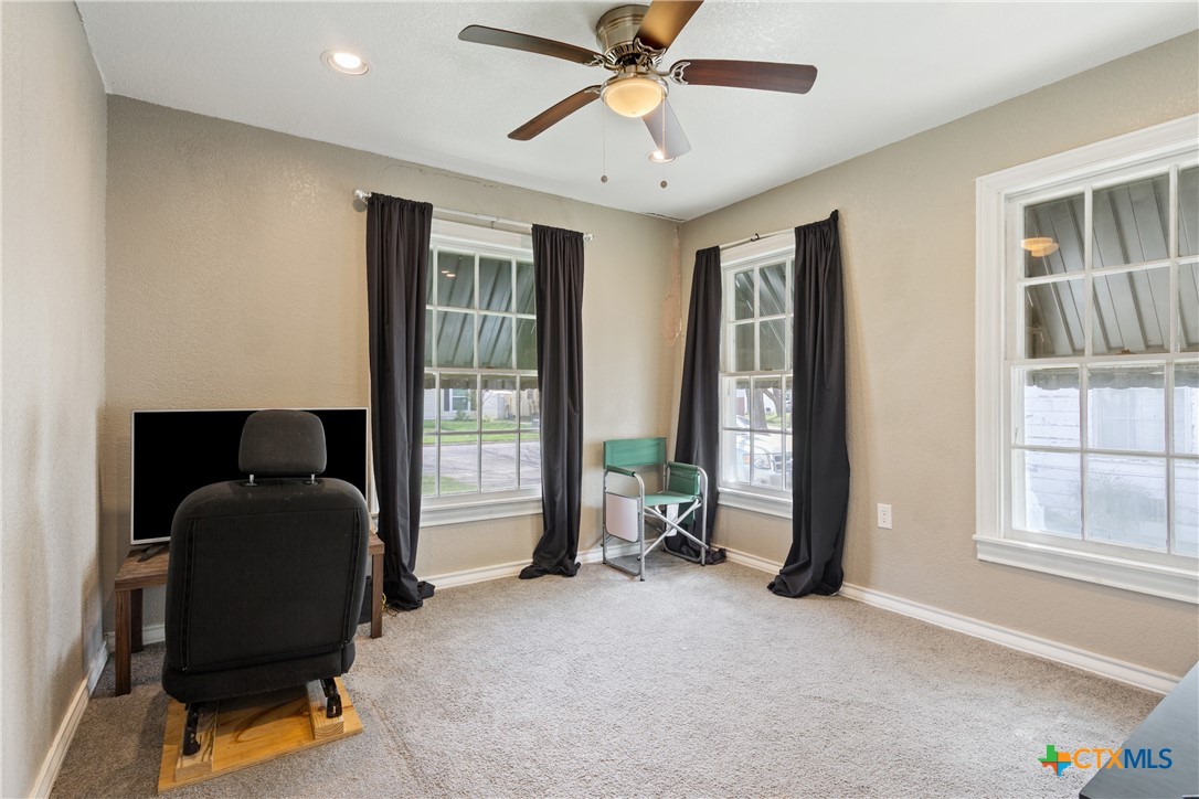 1206 Ashleman Street Waco, TX 76705 - Photo 19 of 26 a living room with furniture and a window