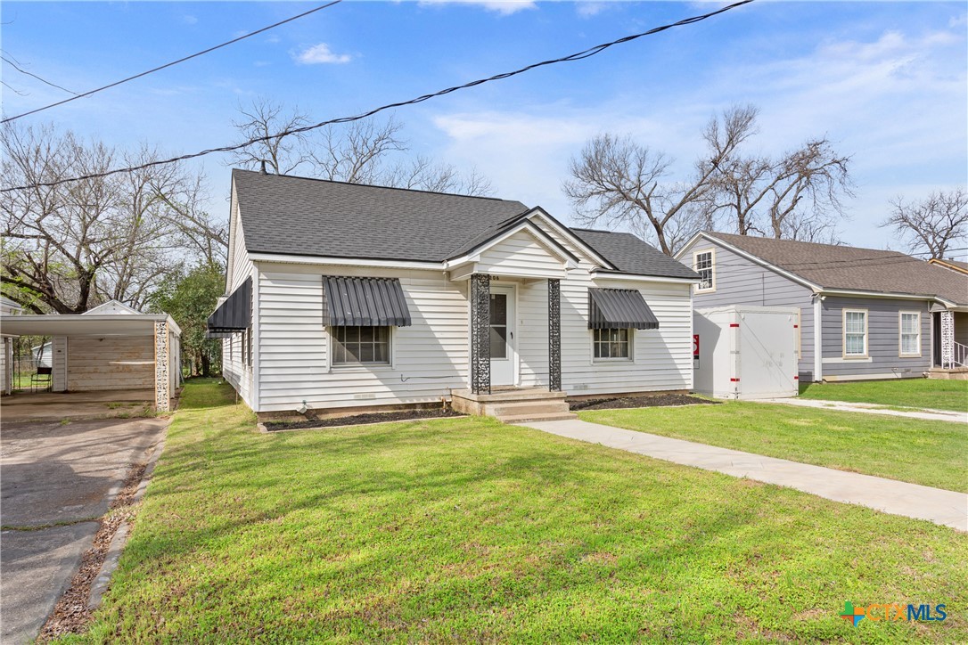 1206 Ashleman Street Waco, TX 76705 - Photo 2 of 26 a front view of a house with a yard