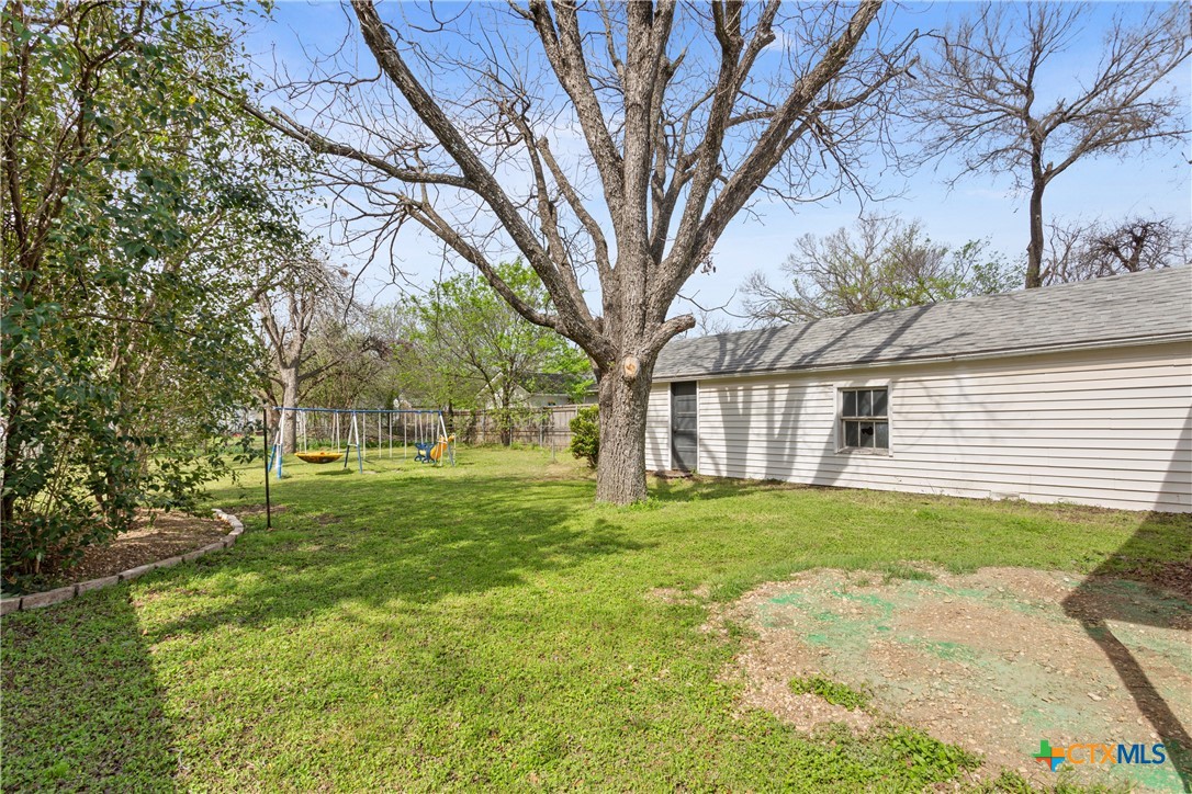 1206 Ashleman Street Waco, TX 76705 - Photo 24 of 26 a view of a house with a yard