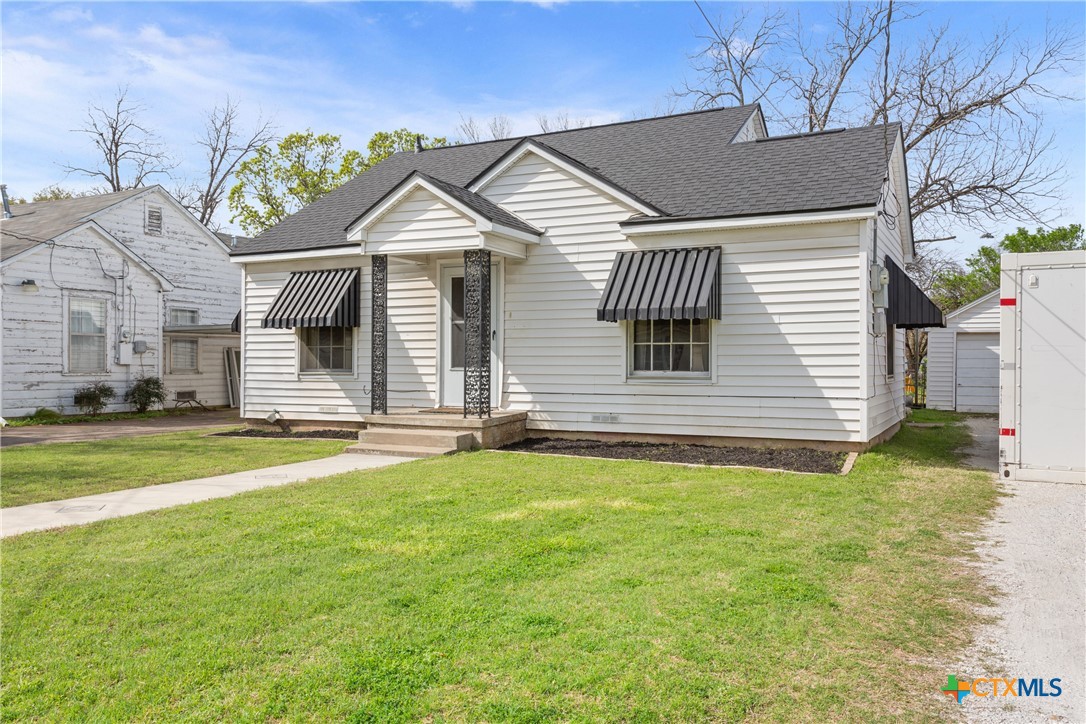 1206 Ashleman Street Waco, TX 76705 - Photo 3 of 26 a view of a house with a yard