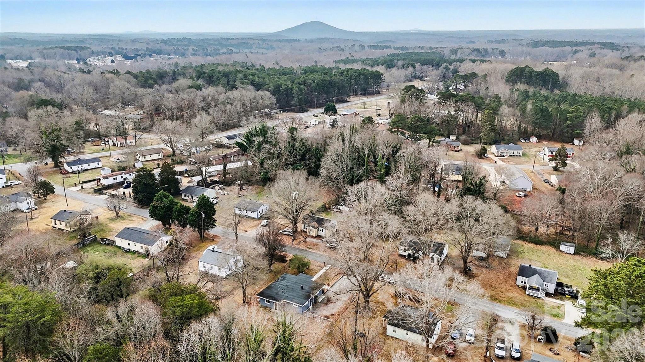 112 Lineberger Street Stanley, NC 28164 - Photo 11 of 32 a view of a forest with mountains in the background