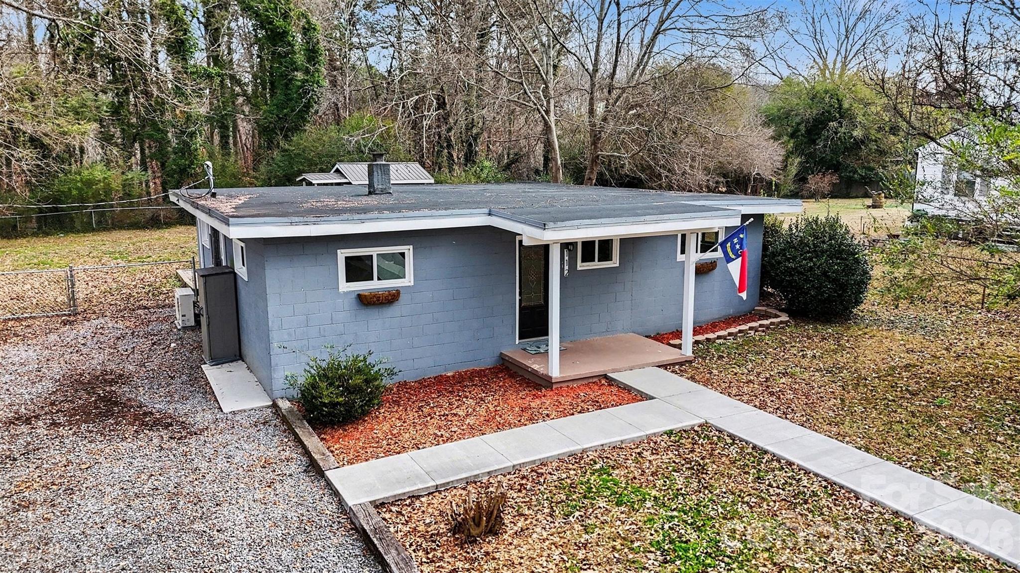 112 Lineberger Street Stanley, NC 28164 - Photo 13 of 32 a view of a house with a patio