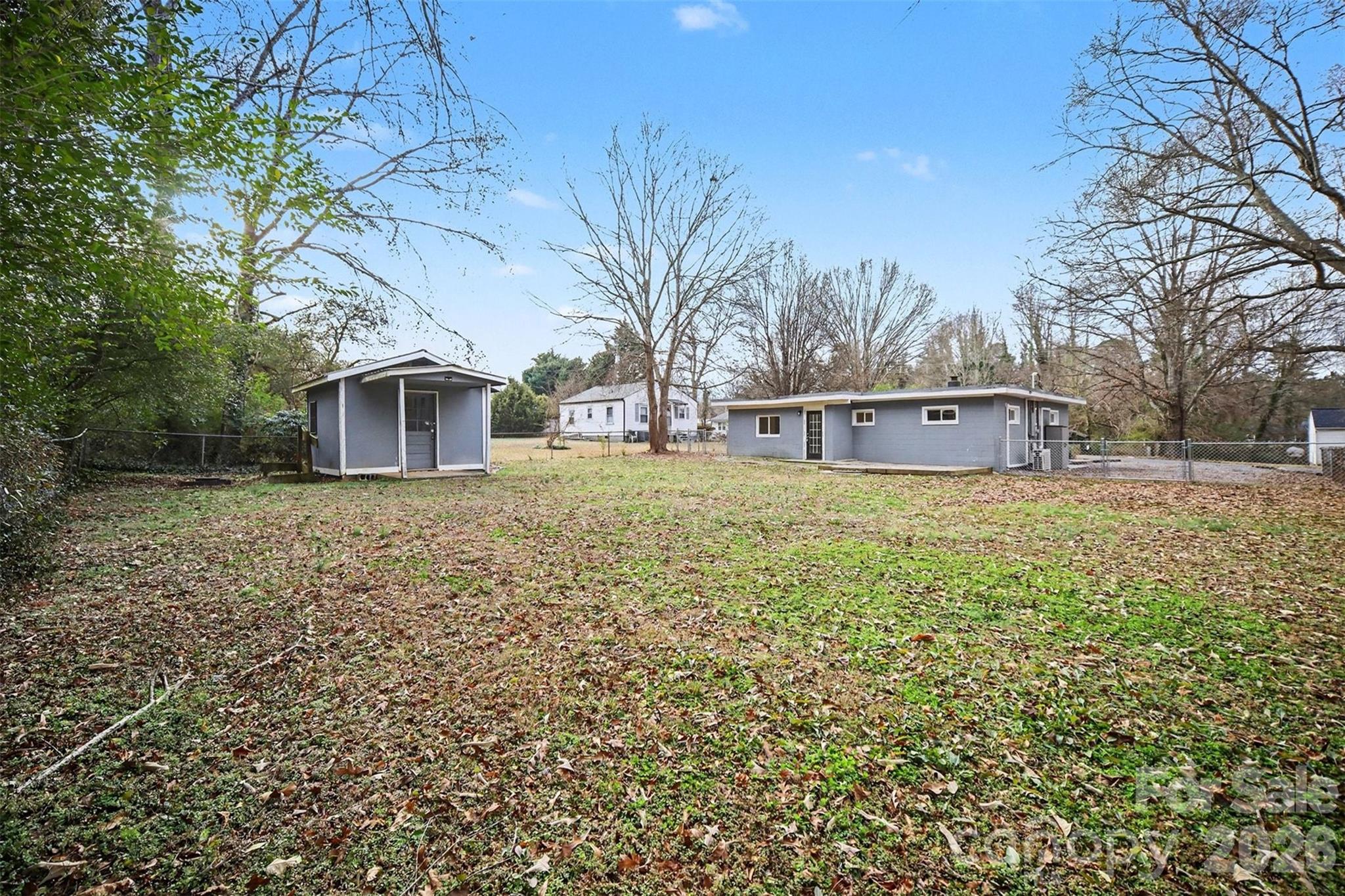 112 Lineberger Street Stanley, NC 28164 - Photo 10 of 32 a view of a house with a yard