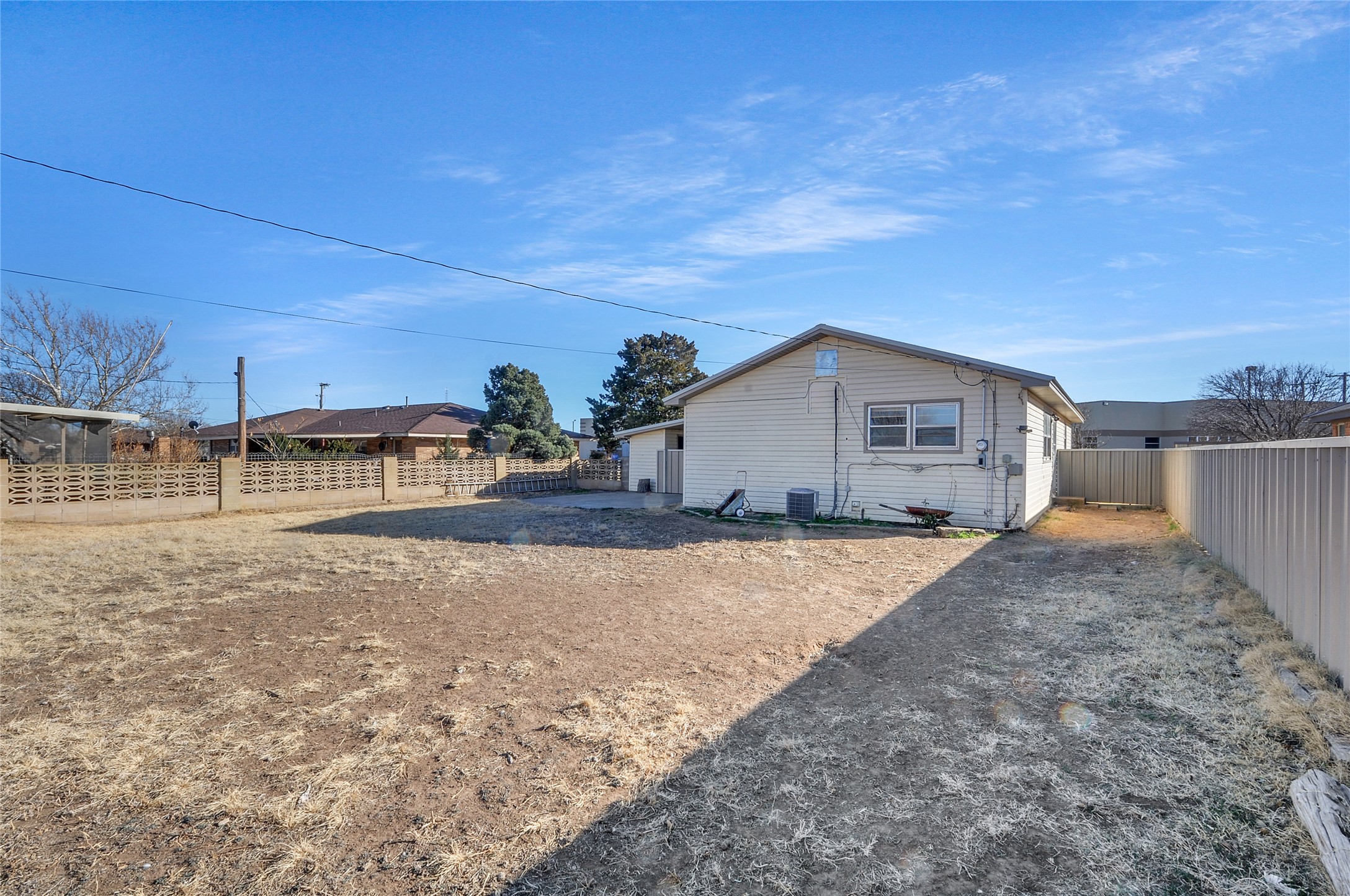 308 West 14th Street Friona, TX 79035 - Photo 18 of 21 Giant Backyard with metal fence