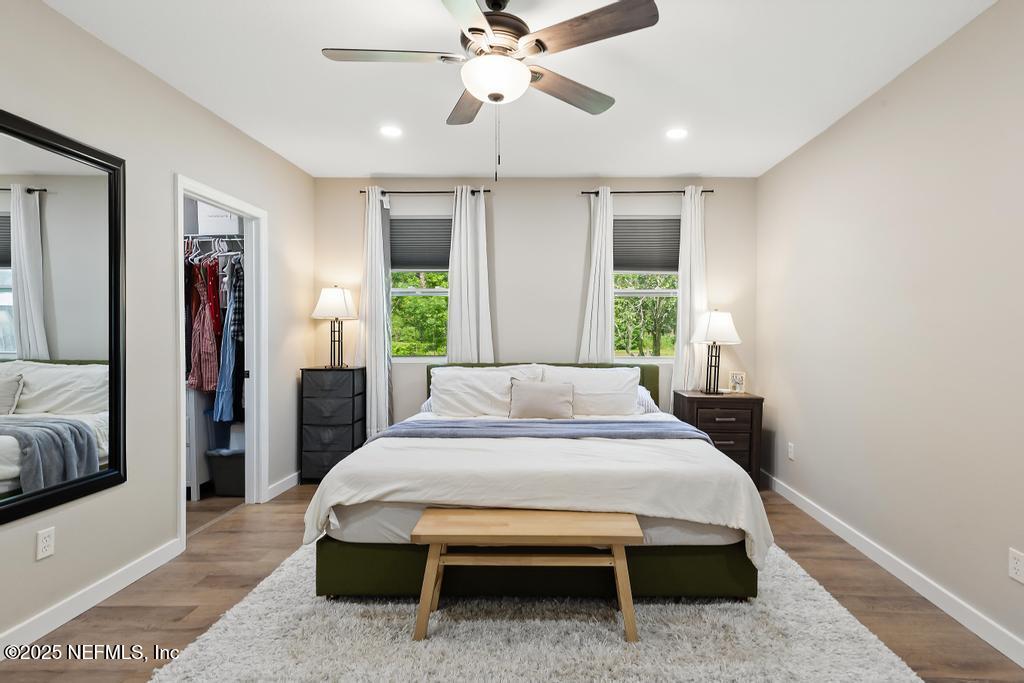 86290 Weldon Road Yulee, FL 32097 - Photo 29 of 50 a bedroom with a bed and window