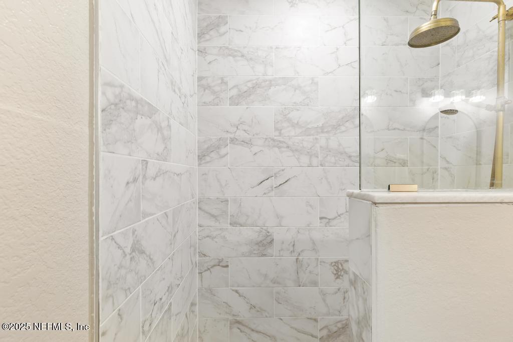 86290 Weldon Road Yulee, FL 32097 - Photo 32 of 50 a bathroom with a shower