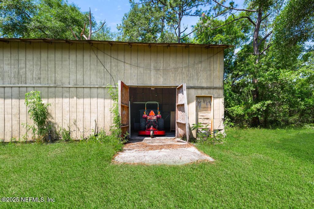86290 Weldon Road Yulee, FL 32097 - Photo 35 of 50 a view of outdoor space and yard