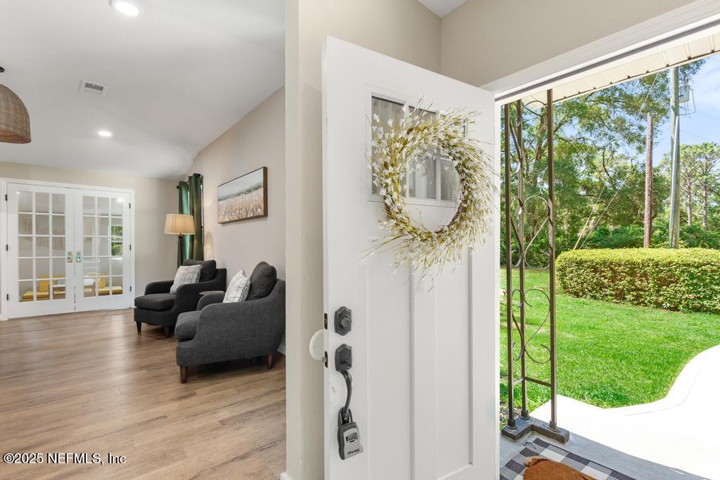 86290 Weldon Road Yulee, FL 32097 - Photo 5 of 50 a living room with furniture and a yard