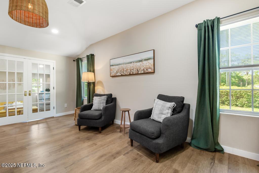 86290 Weldon Road Yulee, FL 32097 - Photo 7 of 50 a living room with furniture and a large window