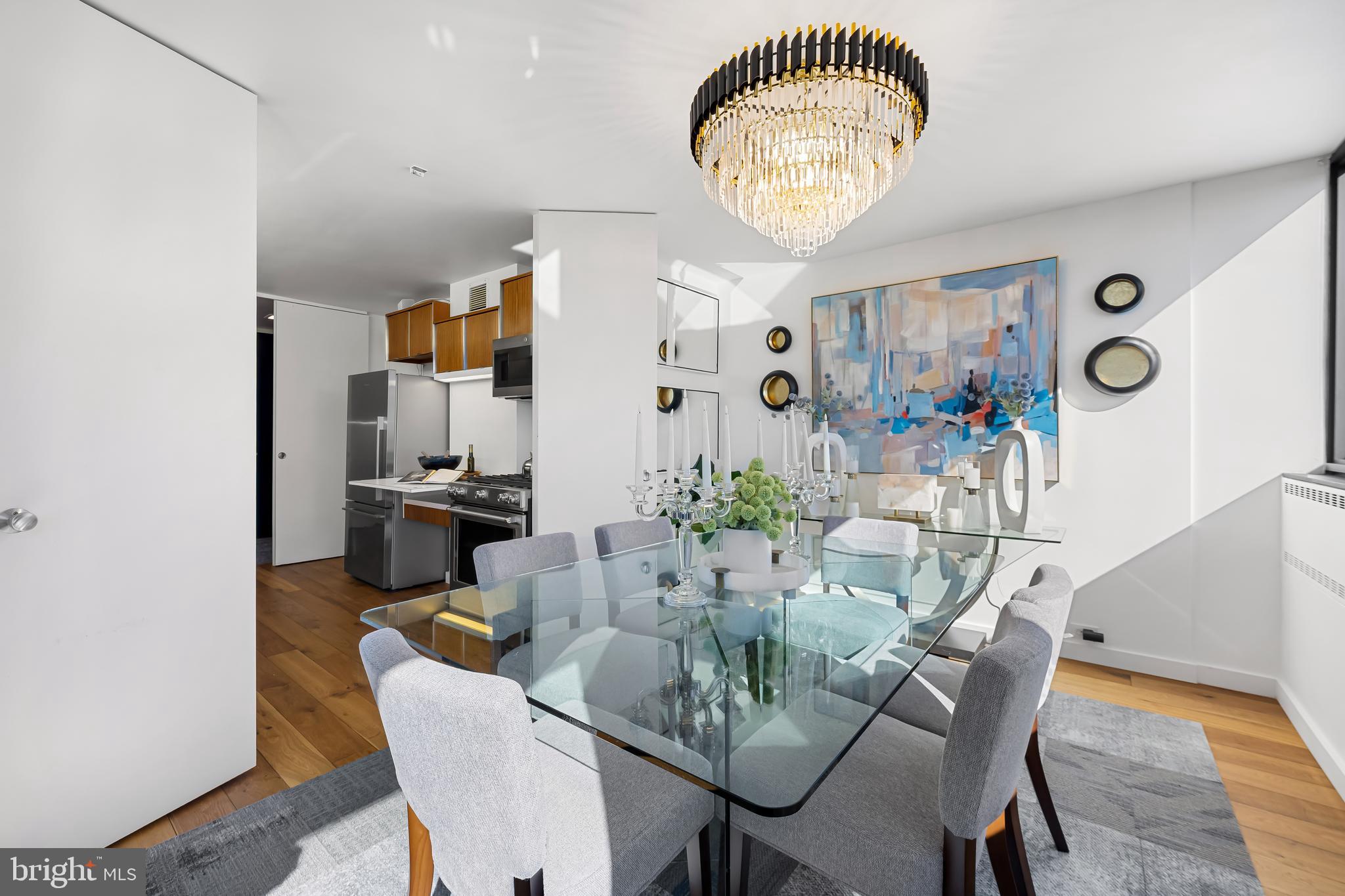 4000 North Charles Street, Unit 1414 Baltimore, MD 21218 - Photo 14 of 45 a view of a dining room with furniture