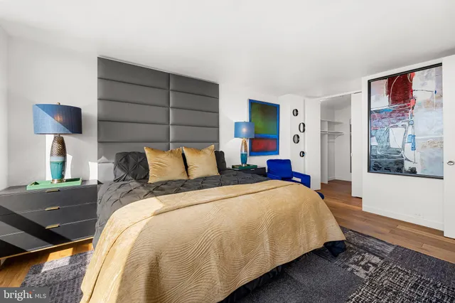 a bedroom with a bed and furniture