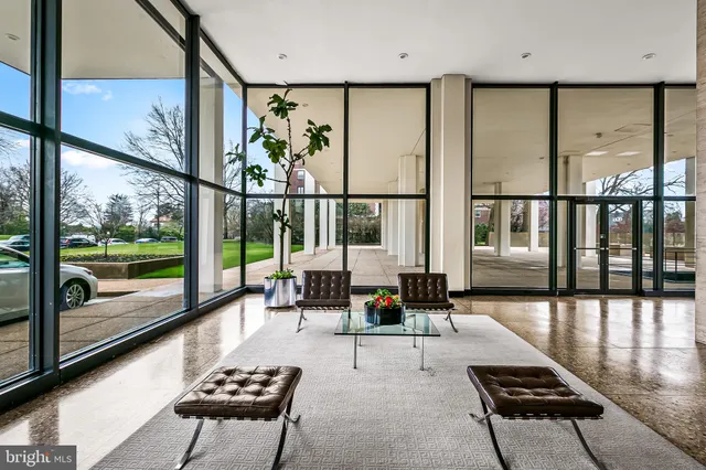 a view of hallway with stainless steel appliances