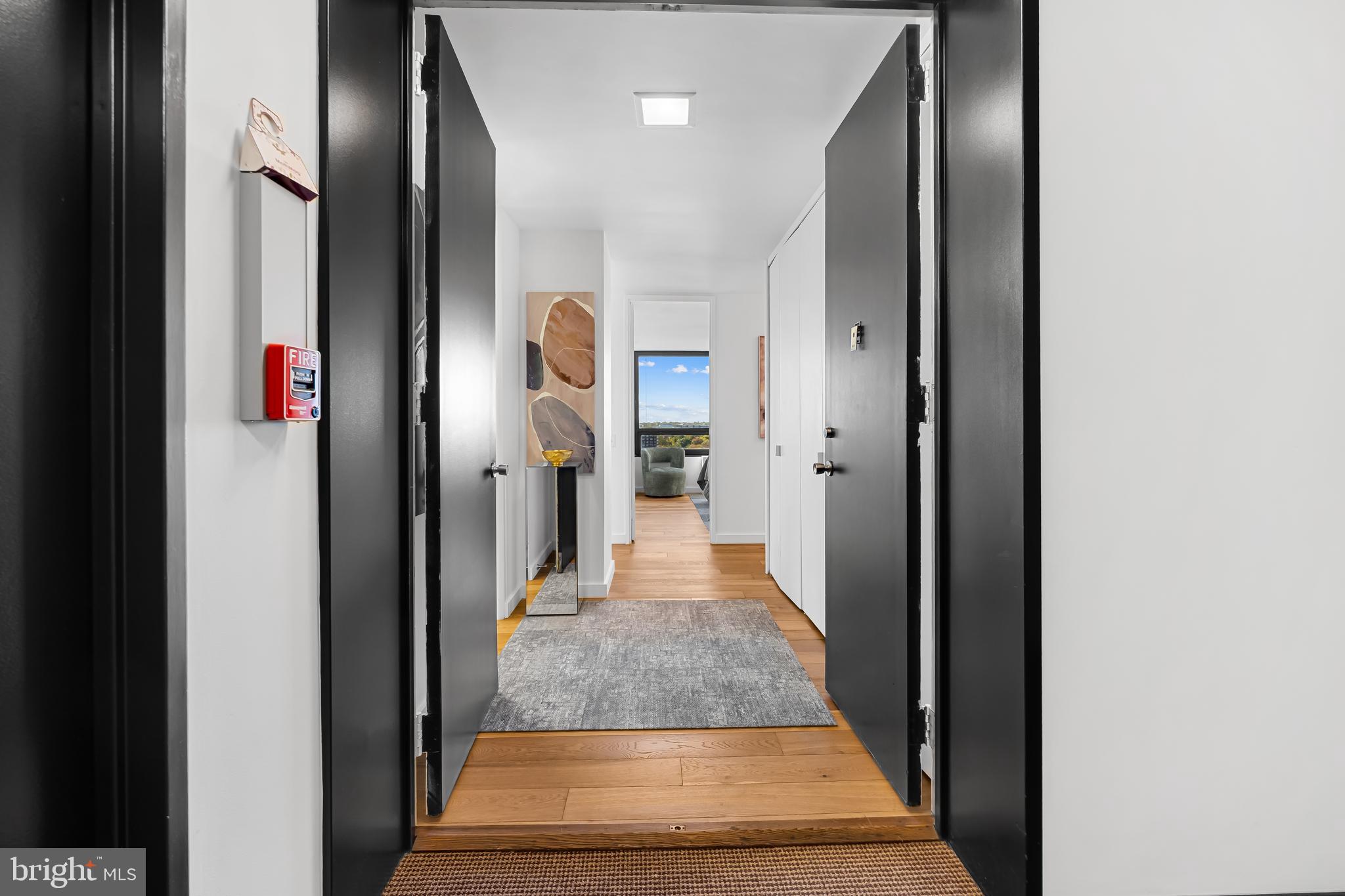 4000 North Charles Street, Unit 1414 Baltimore, MD 21218 - Photo 6 of 45 a view of hallway with stainless steel appliances