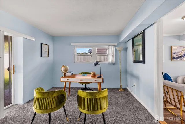 a room with furniture and a window