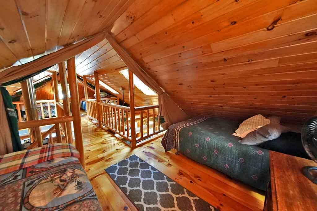 638 Sandy Beach Road Danforth, ME 04424 - Photo 68 of 94 balcony-bedroom-grand-lake