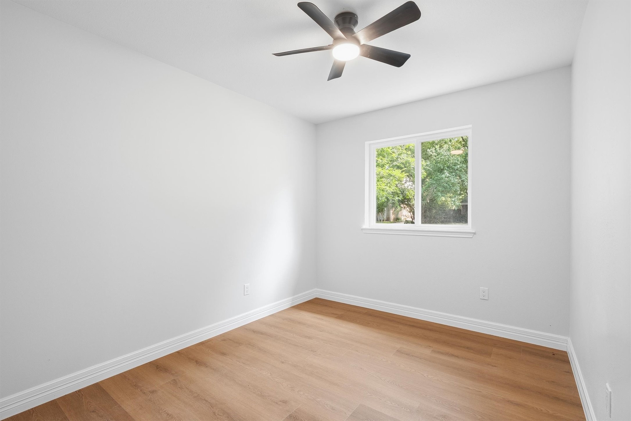 3 Still Corner Place Spring, TX 77381 - Photo 22 of 34 Bedroom 4: This one offers the same flexibility, a quiet spot with tree views that would work just as well as a guest room, office, or playroom.