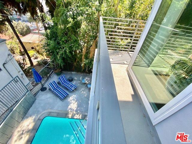 a view of balcony with a garden
