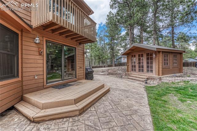 10745 Hungate Road Colorado Springs, CO 80908 - Photo 19 of 46 Convenient access to the covered gazebo which has 220-volt and is hot tub ready.