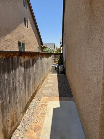 a view of a balcony with wooden floor