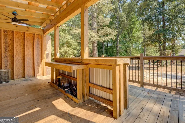 a view of porch with a small deck