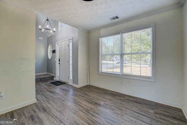 a view of livingroom with hardwood floor and window