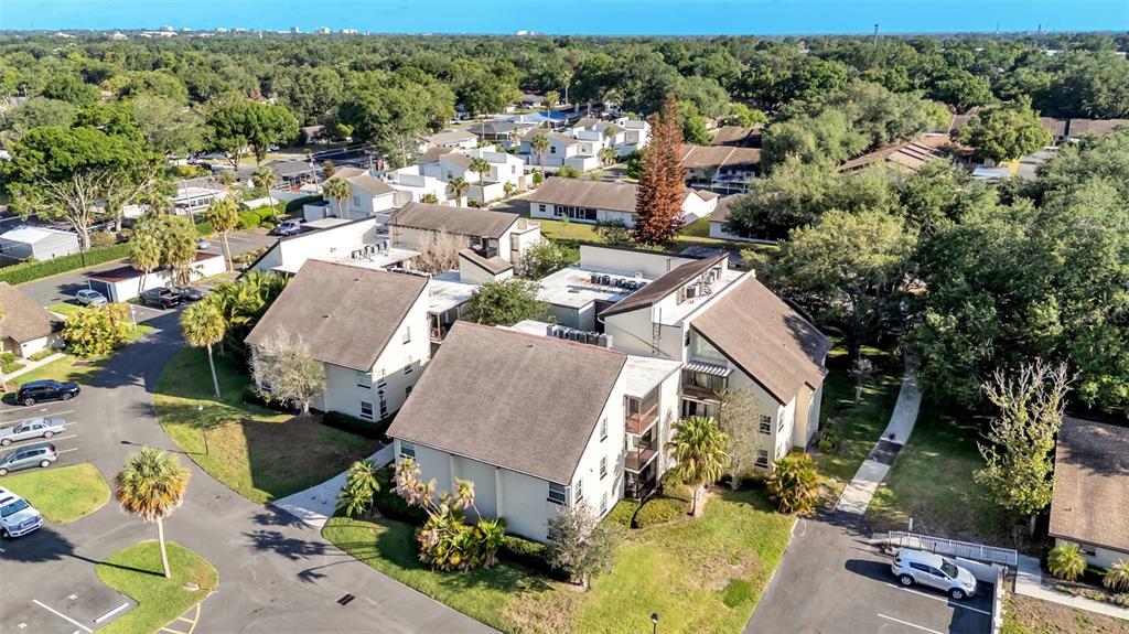 2025 Sylvester Road, Unit N305 Lakeland, FL 33803 - Photo 32 of 34 an aerial view of residential houses with outdoor space