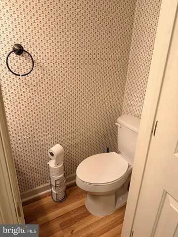 a bathroom with a toilet and a sink