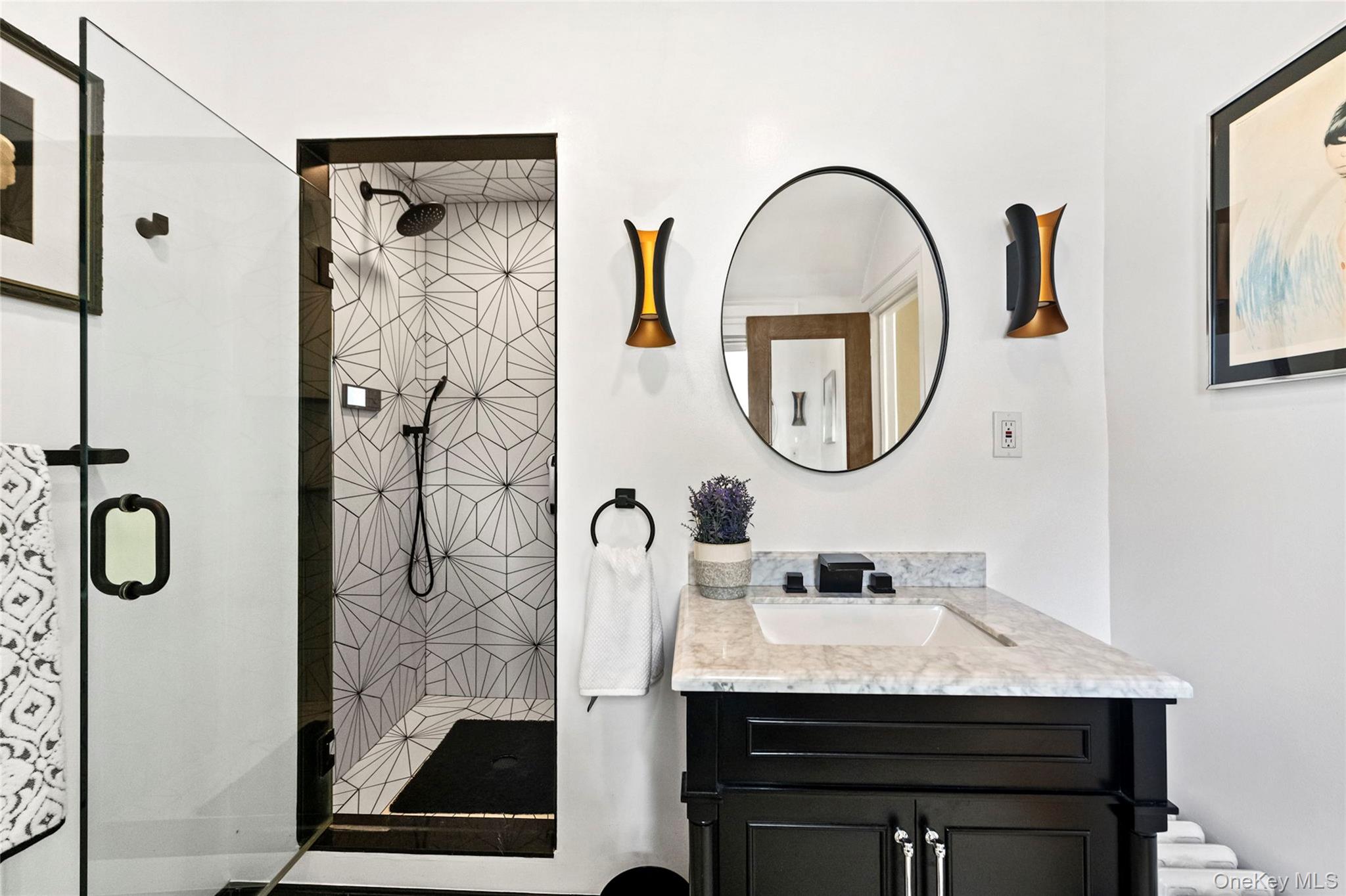 44 Fenimore Road New Rochelle, NY 10804 - Photo 30 of 46 a bathroom with a sink and a mirror