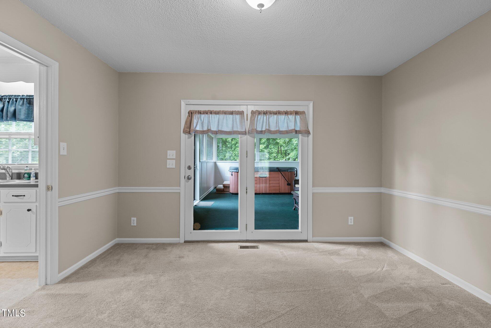 5125 Russell Road Durham, NC 27712 - Photo 13 of 59 an empty room with a window