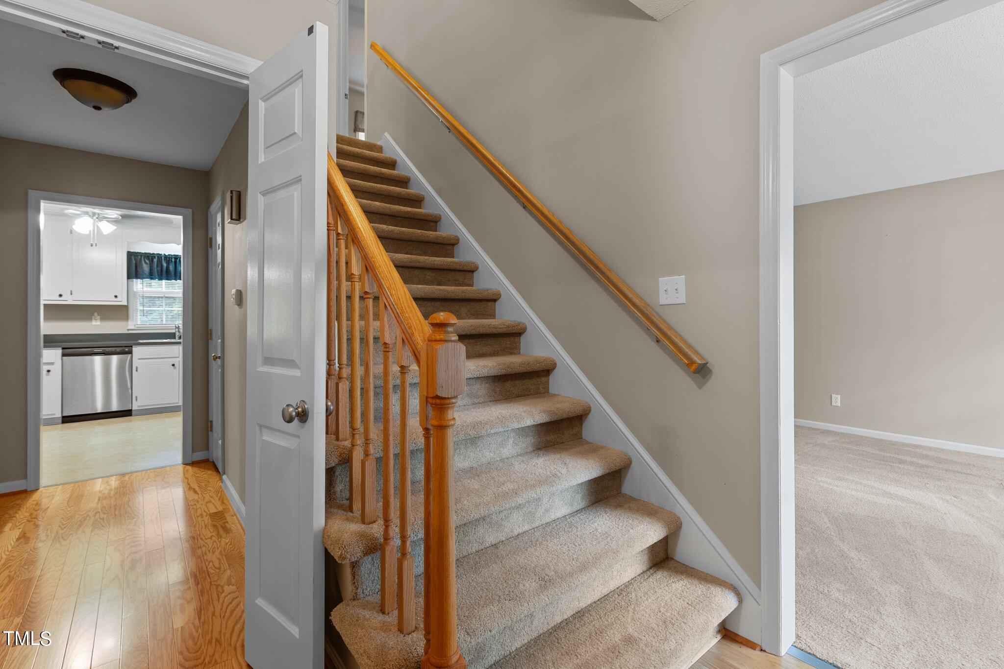 5125 Russell Road Durham, NC 27712 - Photo 4 of 59 a view of entryway and hall with wooden floor