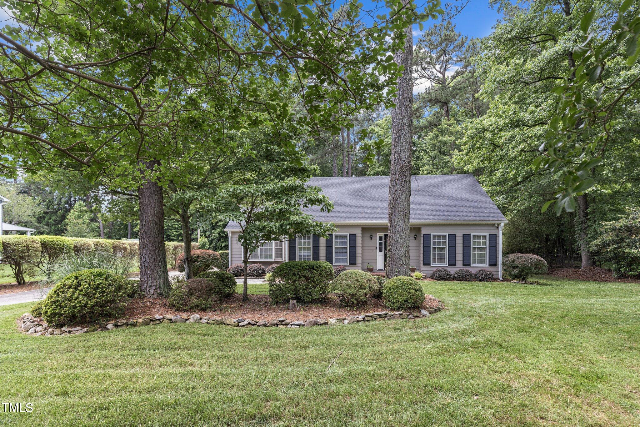 5125 Russell Road Durham, NC 27712 - Photo 52 of 59 a view of a house with a yard