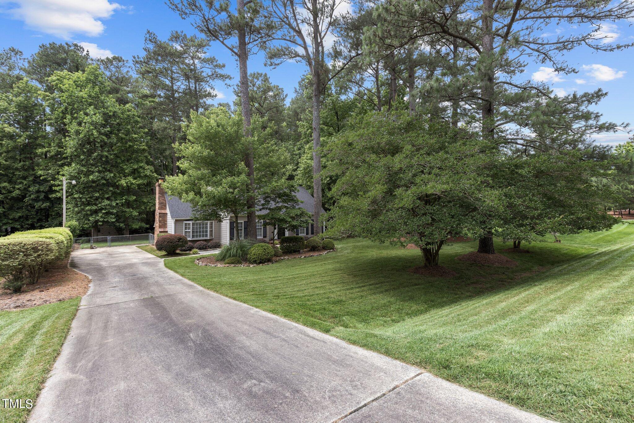5125 Russell Road Durham, NC 27712 - Photo 54 of 59 a view of a backyard with a garden