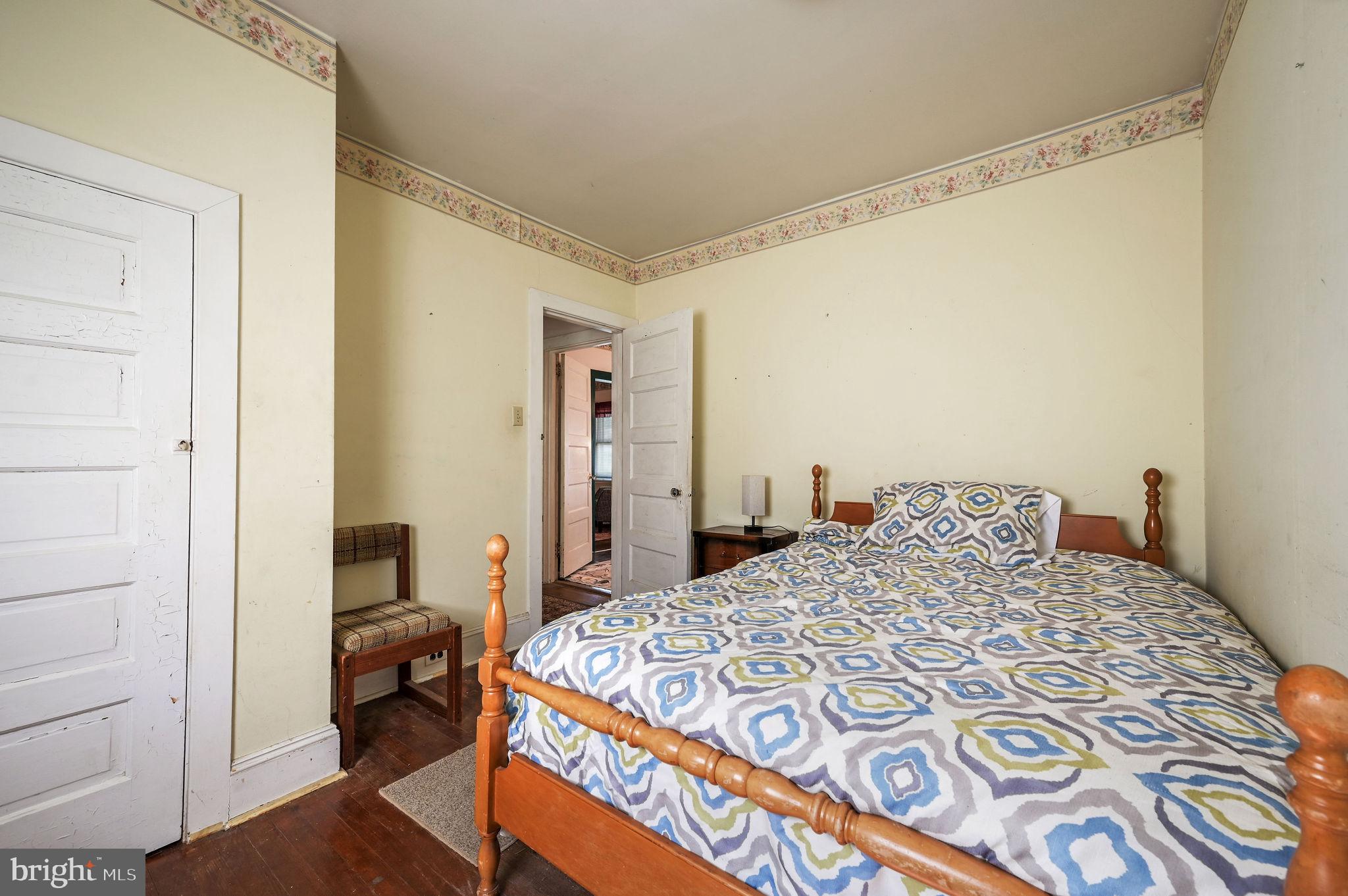 135 Pine Street Dover, DE 19901 - Photo 16 of 27 a bedroom with a bed and a closet