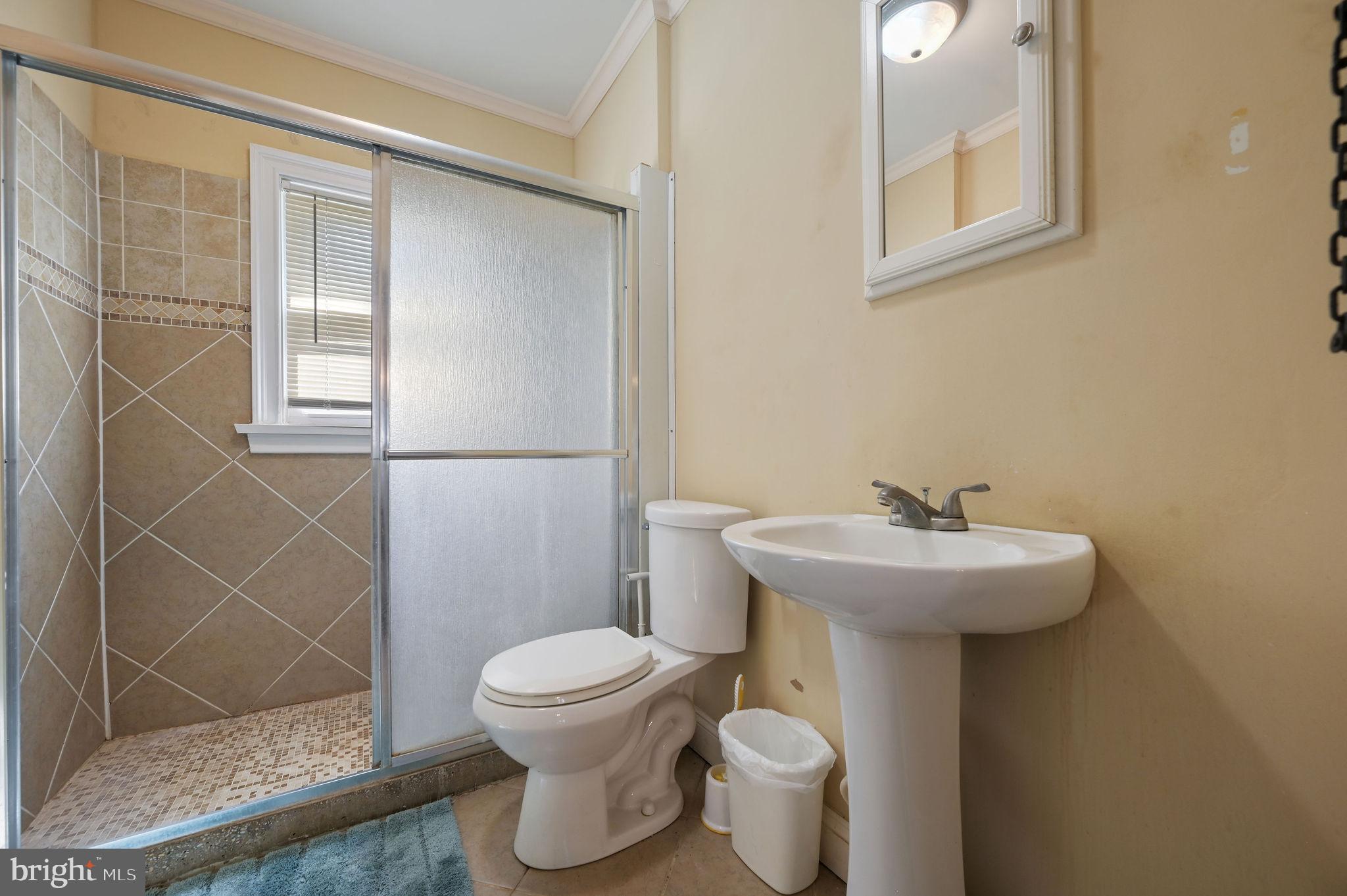 135 Pine Street Dover, DE 19901 - Photo 18 of 27 a bathroom with a sink toilet and shower