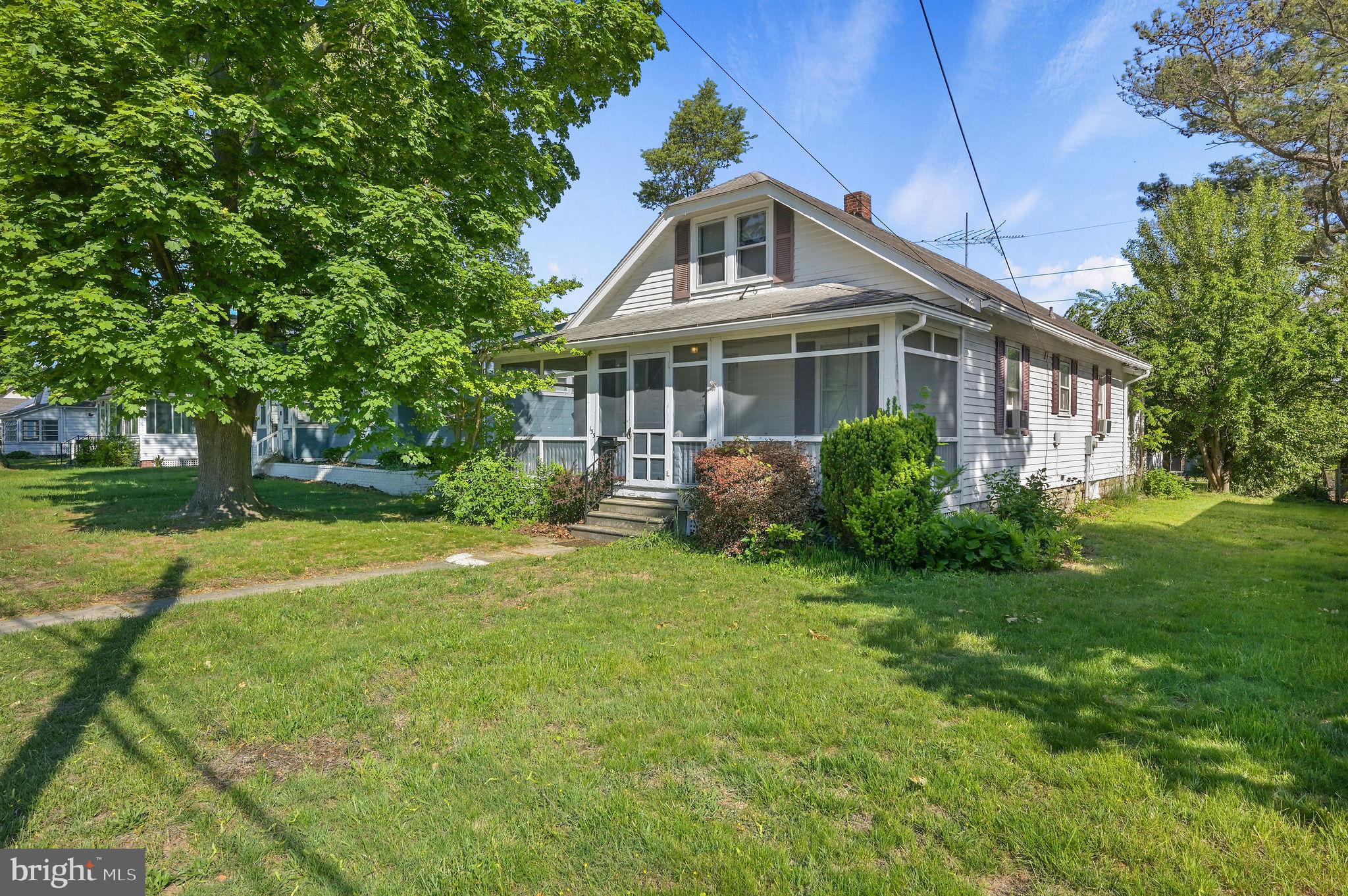 135 Pine Street Dover, DE 19901 - Photo 2 of 27 a front view of a house with a yard