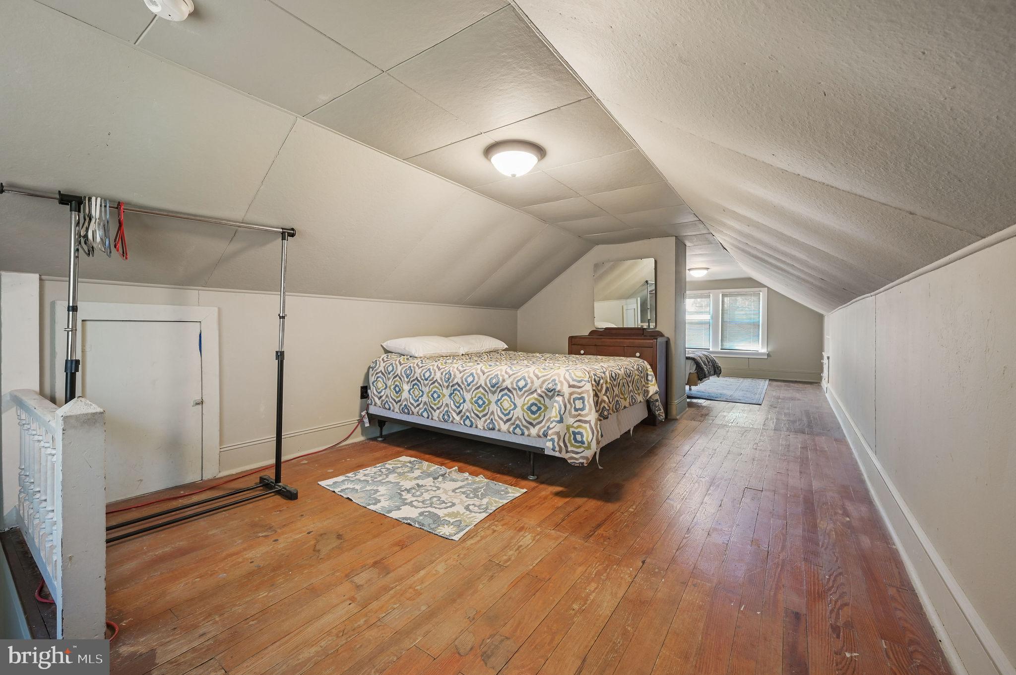135 Pine Street Dover, DE 19901 - Photo 21 of 27 a bedroom with a bed and a window