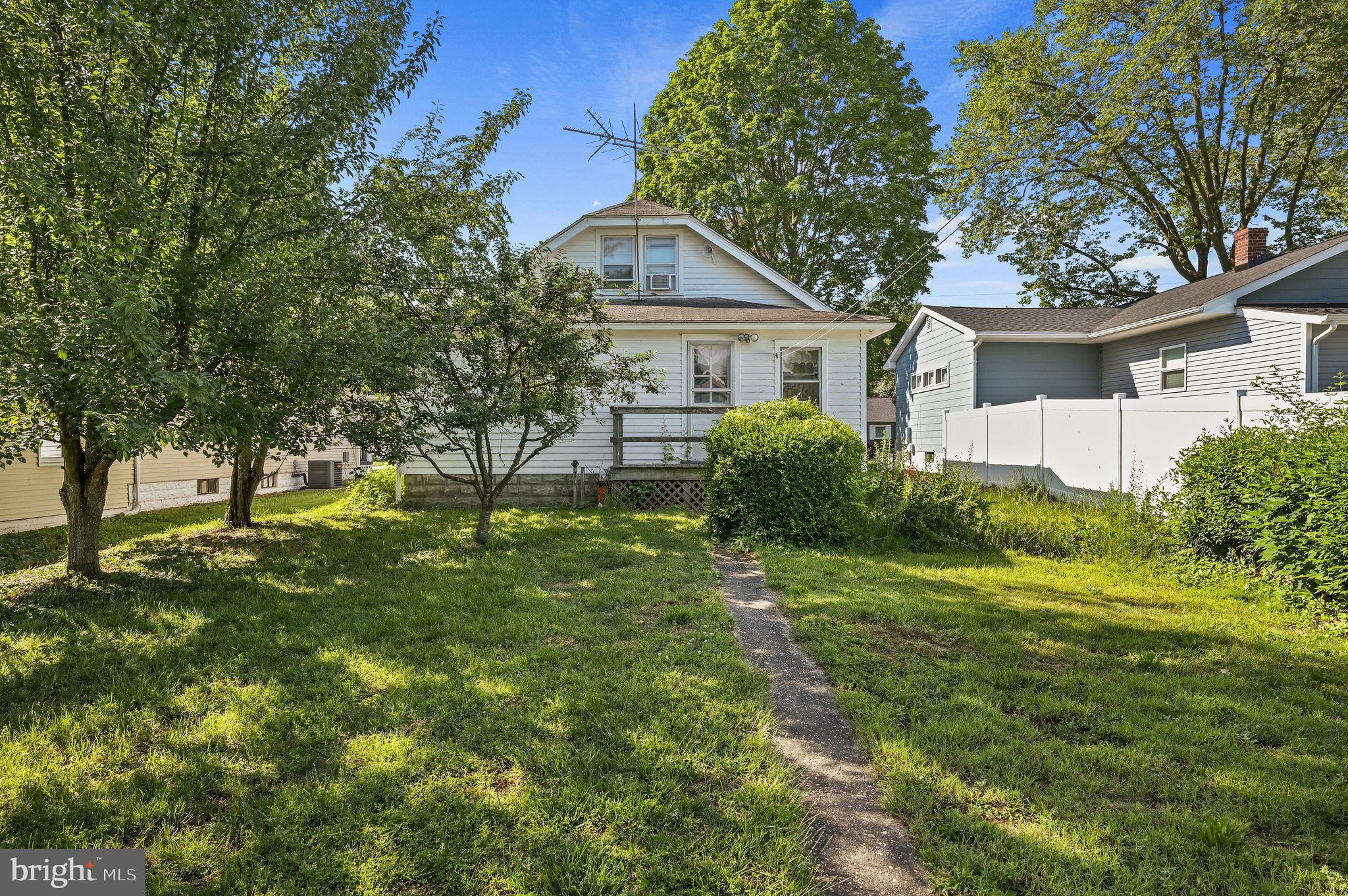 135 Pine Street Dover, DE 19901 - Photo 27 of 27 a front view of house with yard and green space