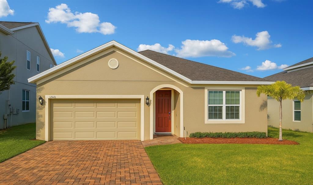 a view of a house with a yard