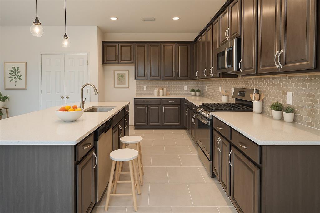 1193 Cavender Creek Road Minneola, FL 34715 - Photo 18 of 22 a kitchen with stainless steel appliances granite countertop a sink stove and cabinets